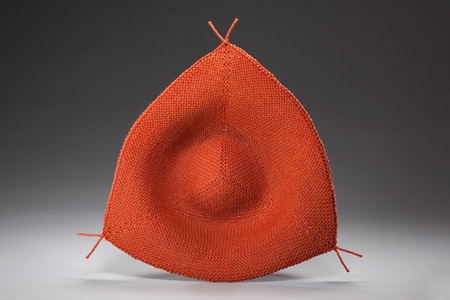 a triangular orange-red weaving